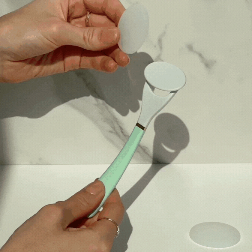 gif of woman using LUNAESCENT tool to apply serum then washing off applicator tool